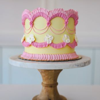 Maria Andree Boutique Bakery - a pink and yellow cake - Cupcakes Near Me - Dallas, Texas Maria Andree Boutique Bakery - a pink and yellow cake - Cupcakes Near Me - Dallas, Texas