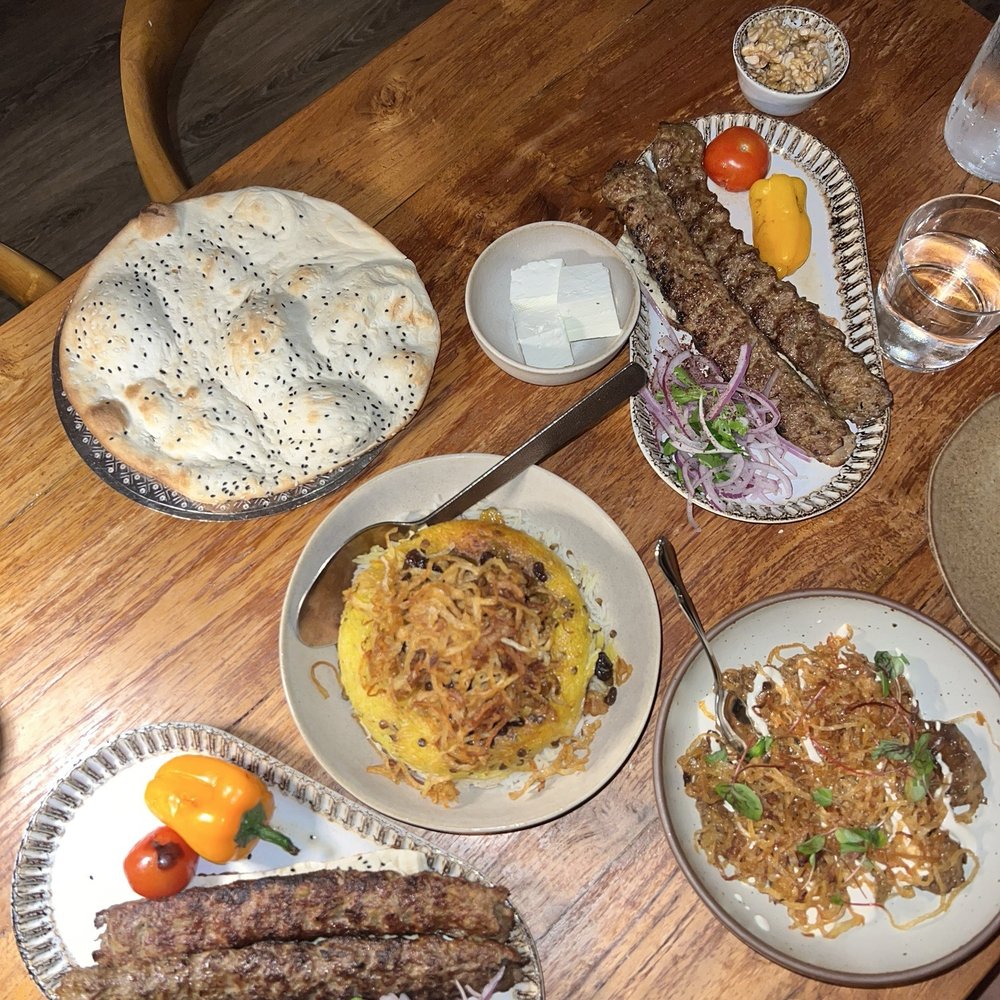 Delbar Middle Eastern - Taftoon bread, feta cheese, walnuts, adas polo tahdig in middle, koobideh kabob (2), kashk bademjoon - Persian/Iranian Near Me - Alpharetta, Georgia Delbar Middle Eastern - Taftoon bread, feta cheese, walnuts, adas polo tahdig in middle, koobideh kabob (2), kashk bademjoon - Persian/Iranian Near Me - Alpharetta, Georgia