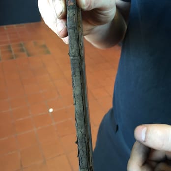Monro Auto Service and Tire Centers - Colin (technician) verifying that it's definitely time for new brakes. I had no clue my brake pads were so worn. - Auto Repair Near Me - Danvers, Massachusetts