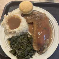 Milestone Soul Food - Turkey wing with mashed potatoes and gravy and collard greens.