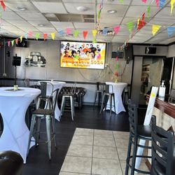 MVP Lounge & Haitian Food - Front lounge area. These sofas/couches are so comfortable.
