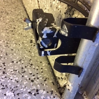 The Epoxy Garage Guy - Epoxy splatters on garage sensor - Flooring Near Me
