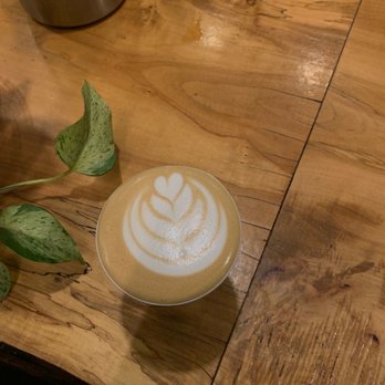 Rising Star Coffee Roasters - Oatmilk Vanilla Bean Latte - Coffee Roasteries Near Me - Lakewood, Ohio Rising Star Coffee Roasters - Oatmilk Vanilla Bean Latte - Coffee Roasteries Near Me - Lakewood, Ohio