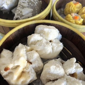 Fook Lam - Steamed Char Siu Bun (front) Lotus Leaf Covered Mochi Rice (left) Siu Mai- Steamed Seafood Pork Hash (right) Dim sum cart. - Dim Sum Near Me - Honolulu, Hawaii Fook Lam - Steamed Char Siu Bun (front) Lotus Leaf Covered Mochi Rice (left) Siu Mai- Steamed Seafood Pork Hash (right) Dim sum cart. - Dim Sum Near Me - Honolulu, Hawaii
