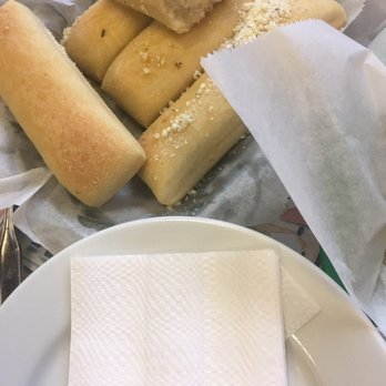 Italiano's Restaurant - Huge amount of bread sticks came with cups of marinara sauce after the mad grab for bread that resulted in an argument over the sauce - Italian Near Me - Baltimore, Maryland