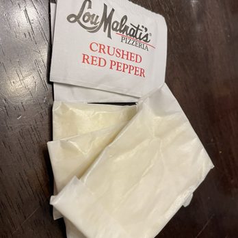 Lou Malnati's Pizzeria - Cute Parmesan cheese in wax paper packets - Pizza Near Me - Lincoln Square, Illinois Lou Malnati's Pizzeria - Cute Parmesan cheese in wax paper packets - Pizza Near Me - Lincoln Square, Illinois