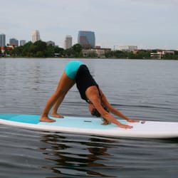 Paddleboard Yoga, classes held 7 days a week.