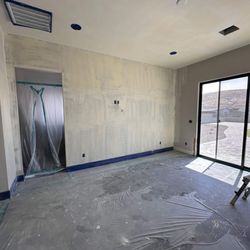 Capstone Homes at Jasper - Master Bedroom sliding door leak & smooth walls. Leak reported 7/2023, flooring removed 3/2024, completed 9/2024. Water under the plastic.