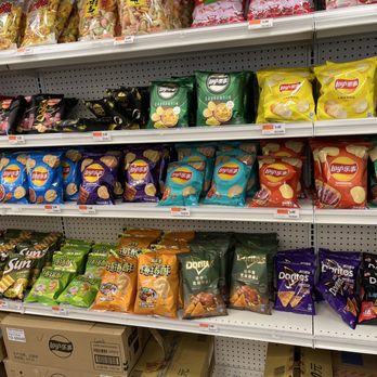 J Life Mart - a shelf of chips and snacks - Convenience Stores Near Me - Providence, Rhode Island