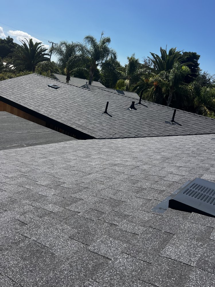 Slide of Kayhan's Roofing