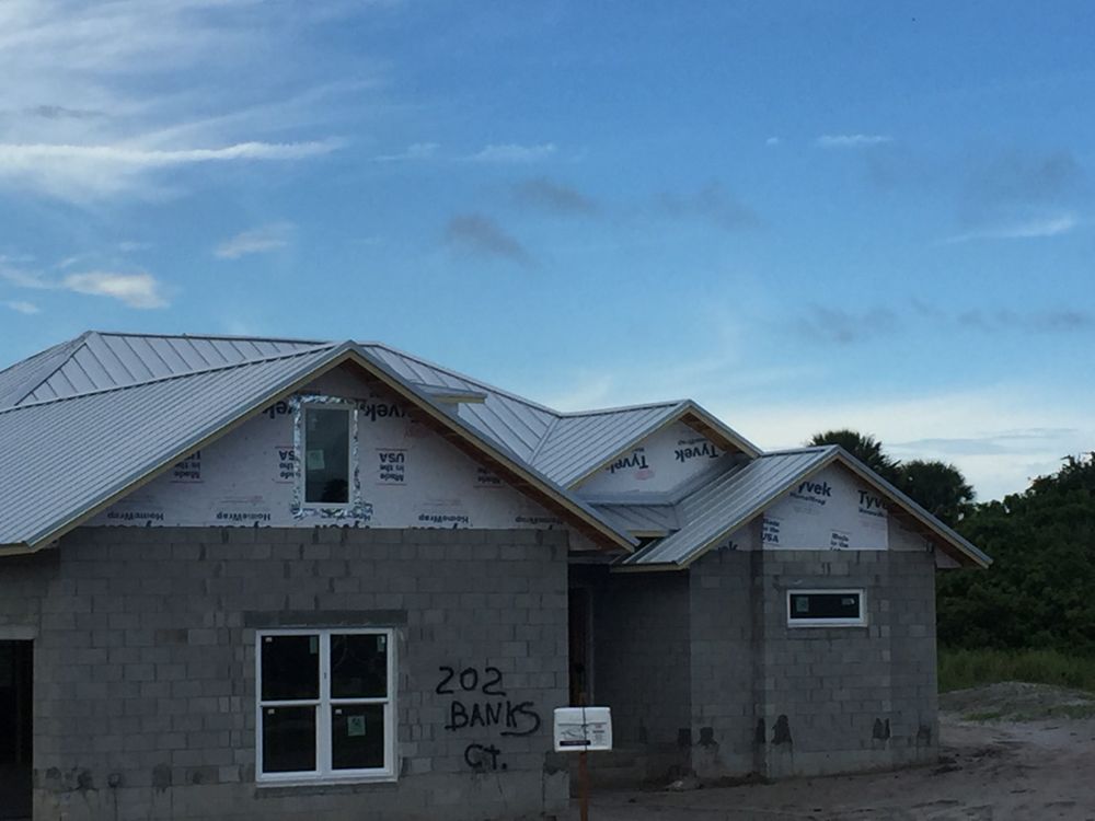 Slide of Freedom Roofers