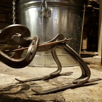 Snake River Brewing - Skier made of horseshoes on the fireplace mantle. - Brewpubs Near Me - Jackson, Wyoming Snake River Brewing - Skier made of horseshoes on the fireplace mantle. - Brewpubs Near Me - Jackson, Wyoming