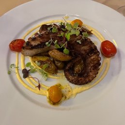 Grilled octopus with fingerling potatoes and Peruvian huacaina sauce