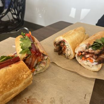 Golden Banh Mi - braised pork belly banh mi (left) and roasted pork belly banh mi (right) - Vietnamese Near Me - Aurora, Colorado Golden Banh Mi - braised pork belly banh mi (left) and roasted pork belly banh mi (right) - Vietnamese Near Me - Aurora, Colorado