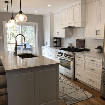 Zen Interior Design - a kitchen with white cabinets and stainless steel appliances - Interior Design Near Me - Arnprior, Ontario Zen Interior Design - a kitchen with white cabinets and stainless steel appliances - Interior Design Near Me - Arnprior, Ontario