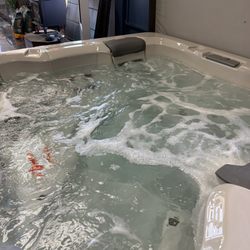 Emerald Pool & Patio - Bullfrog spa on display in showroom