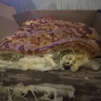 Calzone Life - I don't review but I'm not sorry for this 3/4 eaten pic 9f this custom calzone I dub, "The slapper" the mona lizzzaaa of calzone. - Pizza Near Me - Escondido, California Calzone Life - I don't review but I'm not sorry for this 3/4 eaten pic 9f this custom calzone I dub, "The slapper" the mona lizzzaaa of calzone. - Pizza Near Me - Escondido, California