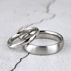 Aurum Designer Jewellers - A bespoke pair of platinum court wedding rings