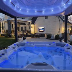 Deck Remodelers - Hot tub with motorized lid.