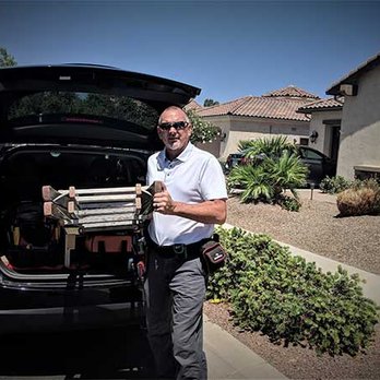 Coakley Construction and Inspection Services - a man standing in front of a car with a ladder - Home Inspectors Near Me Coakley Construction and Inspection Services - a man standing in front of a car with a ladder - Home Inspectors Near Me