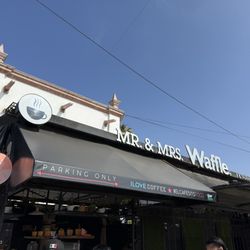 Mr. & Mrs. Waffle - Sign visible at intersection near the bridge
