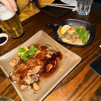 Raku Izakaya - Sliced Steak w/ Garlic Chips garlic shrimp - Tapas/Small Plates Near Me - Fort Lee, New Jersey Raku Izakaya - Sliced Steak w/ Garlic Chips garlic shrimp - Tapas/Small Plates Near Me - Fort Lee, New Jersey