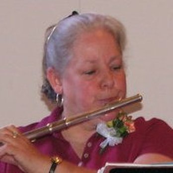 Herb Place - a woman playing a flute - Health Markets Near Me - Clearfield, Pennsylvania Herb Place - a woman playing a flute - Health Markets Near Me - Clearfield, Pennsylvania