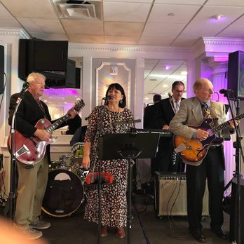 Lagreci"s Staaten - The Band on raised stage - Caterers Near Me - Staten Island, New York Lagreci"s Staaten - The Band on raised stage - Caterers Near Me - Staten Island, New York