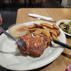 B & D's Grill - Iowa Cutlet with potato wedges, unexpected applesauce, and grilled veggies in the back (more pan seared than grilled).