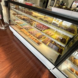 a display of donuts in a bakery