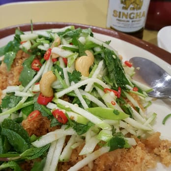 Thai Flavor - Yum (salad) Pla-duk (catfish) topped with green apple/mango lime salad. - Thai Near Me - Aurora, Colorado Thai Flavor - Yum (salad) Pla-duk (catfish) topped with green apple/mango lime salad. - Thai Near Me - Aurora, Colorado