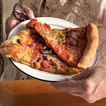 Brown Dog Pizza - 2 slices of Brown Dog Supreme Pizza - Pizza Near Me - Telluride, Colorado Brown Dog Pizza - 2 slices of Brown Dog Supreme Pizza - Pizza Near Me - Telluride, Colorado