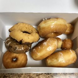 Saginaw Donut Shop - Donuts placed carelessly in box :-/