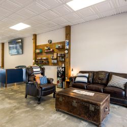 The Carpenters Chair Barbershop - Relaxing waiting space at our Cape Coral barber shop, perfect before your next fresh cut.