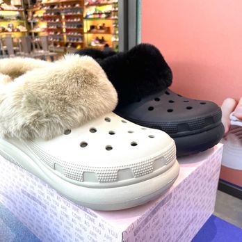 Francis Scott Key Mall - a pair of crocs and a pair of slippers - Shopping Centers Near Me - Frederick, Maryland
