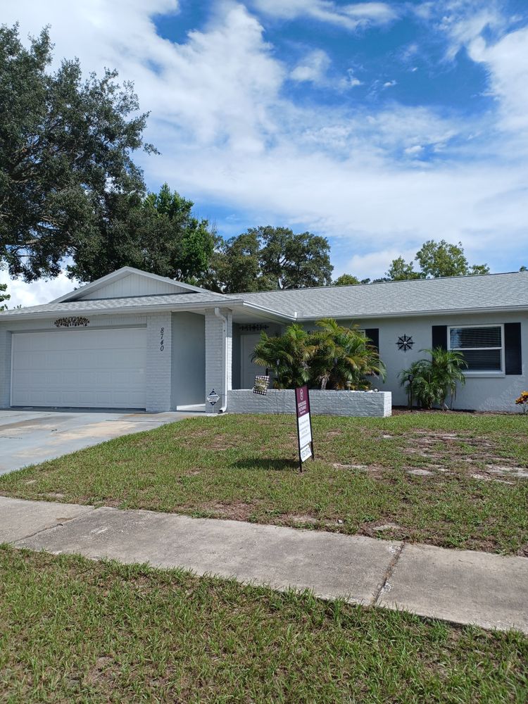 Slide of Dunedin Roofing