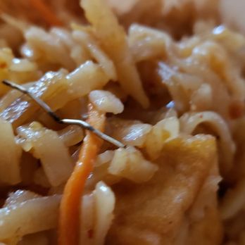 Jai Thai - Pad Thai, closeup of metal staple - Thai Near Me - Seattle, Washington Jai Thai - Pad Thai, closeup of metal staple - Thai Near Me - Seattle, Washington