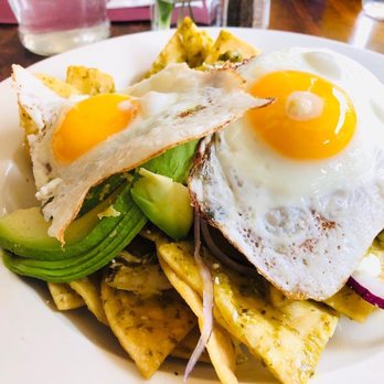 Laly's Restaurant - Chilaquiles with fried eggs - New American Near Me - Jackson Heights, New York Laly's Restaurant - Chilaquiles with fried eggs - New American Near Me - Jackson Heights, New York