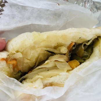 Caribbean Cuisine - Veggie loaf, which is really just their Steam Cabbage on Coco - Bread. - Caribbean Near Me - Dover, Delaware Caribbean Cuisine - Veggie loaf, which is really just their Steam Cabbage on Coco - Bread. - Caribbean Near Me - Dover, Delaware