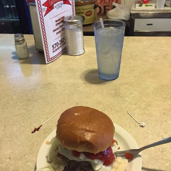 Carwanna - a hamburger on a plate with a fork - Breakfast & Brunch Near Me - Carbondale, Pennsylvania Carwanna - a hamburger on a plate with a fork - Breakfast & Brunch Near Me - Carbondale, Pennsylvania