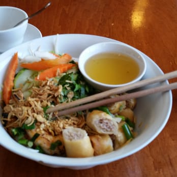 Saigon Restaurant - Grilled shrimp and egg roll noodle bowl with fresh lettuce, mint, basil, bean sprouts, and a side of fish sauce. - Vietnamese Near Me - Portland, Maine Saigon Restaurant - Grilled shrimp and egg roll noodle bowl with fresh lettuce, mint, basil, bean sprouts, and a side of fish sauce. - Vietnamese Near Me - Portland, Maine