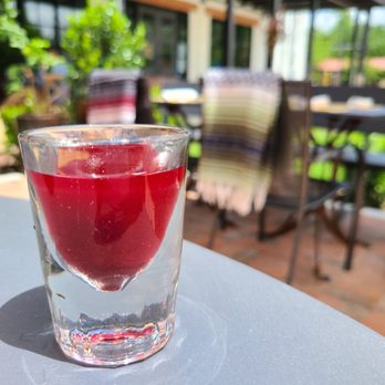 Pharm Table - Wellness shot of beet - Cocktail Bars Near Me - San Antonio, Texas