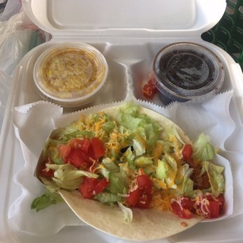 Hull's Seafood - Fish taco with blackened cod, rice and beans. Amazing!! - Seafood Near Me - Ormond Beach, Florida