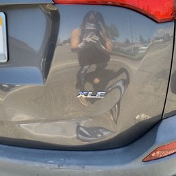 BEFORE - huge dent caused by someone backing up into my car