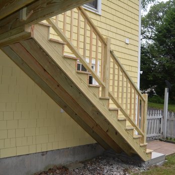 Glenn Battistelli Construction - a staircase going up to a house - Roofing Near Me - Beverly, Massachusetts