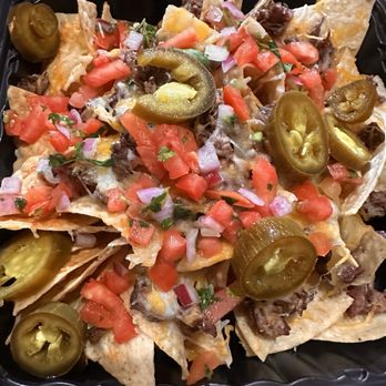 DiablosTacos Mexican Grill - Steak nachos with beans, Guac and sour cream on side (picky family) - Mexican Near Me - Stevenson Ranch, California DiablosTacos Mexican Grill - Steak nachos with beans, Guac and sour cream on side (picky family) - Mexican Near Me - Stevenson Ranch, California