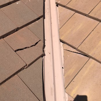 Arizona's Roof Consultant - Cracked tiles near Chanel metal. Disrupts the proper flow of water - Roof Inspectors Near Me - Gilbert, Arizona Arizona's Roof Consultant - Cracked tiles near Chanel metal. Disrupts the proper flow of water - Roof Inspectors Near Me - Gilbert, Arizona