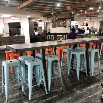 Tuva Food Hall - tables and stools - Convenience Stores Near Me - Riverview, Florida