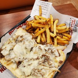 Penn Station East Coast Subs - 8" philly cheesesteak.  No peppers,no sauce, small fries