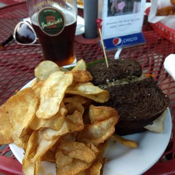 Sonka Irish Pub - Turkey pastrami on rye, house-made chips paired with a nice Smithwick's Red Ale - Irish Pub Near Me - Terre Haute, Indiana Sonka Irish Pub - Turkey pastrami on rye, house-made chips paired with a nice Smithwick's Red Ale - Irish Pub Near Me - Terre Haute, Indiana